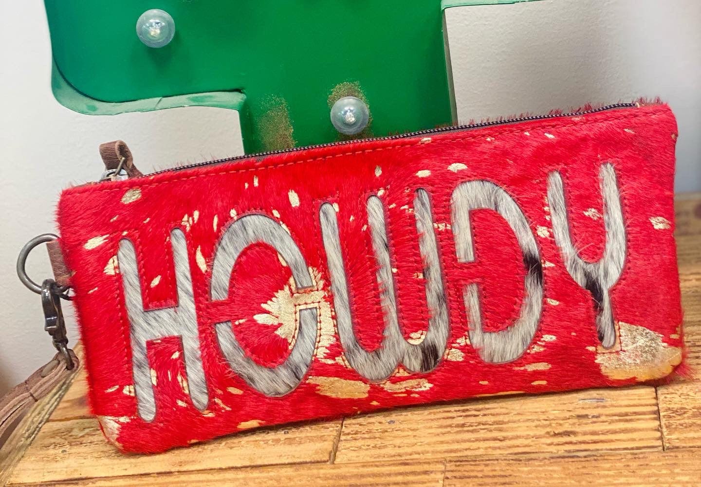 The Rodeo Cowhide Clutch Collection