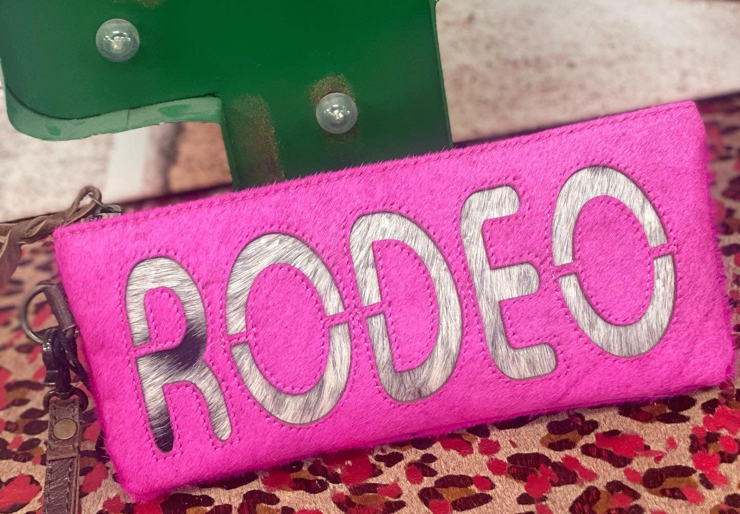 The Rodeo Cowhide Clutch Collection